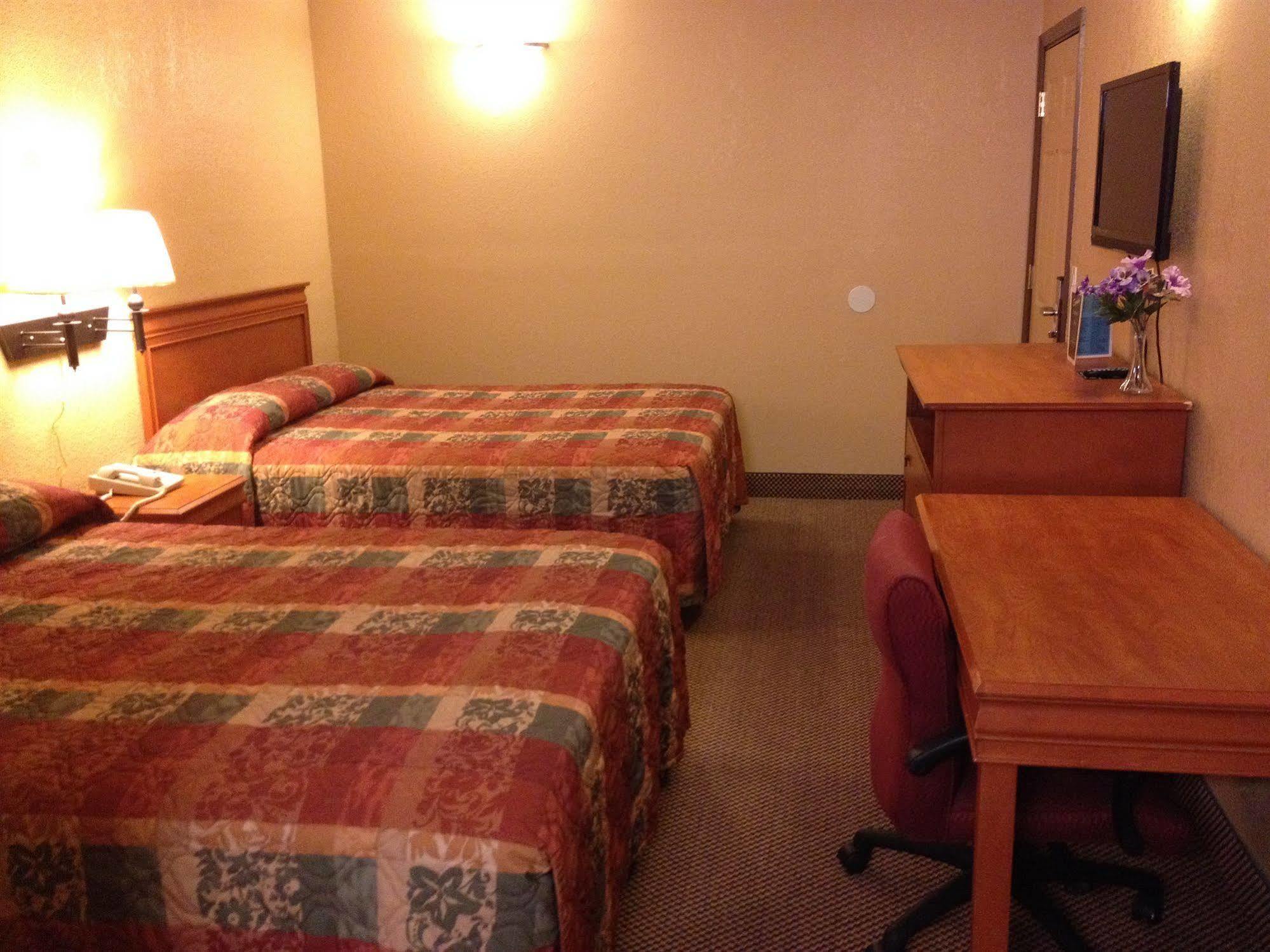Economy Express Inn Henryetta Экстерьер фото